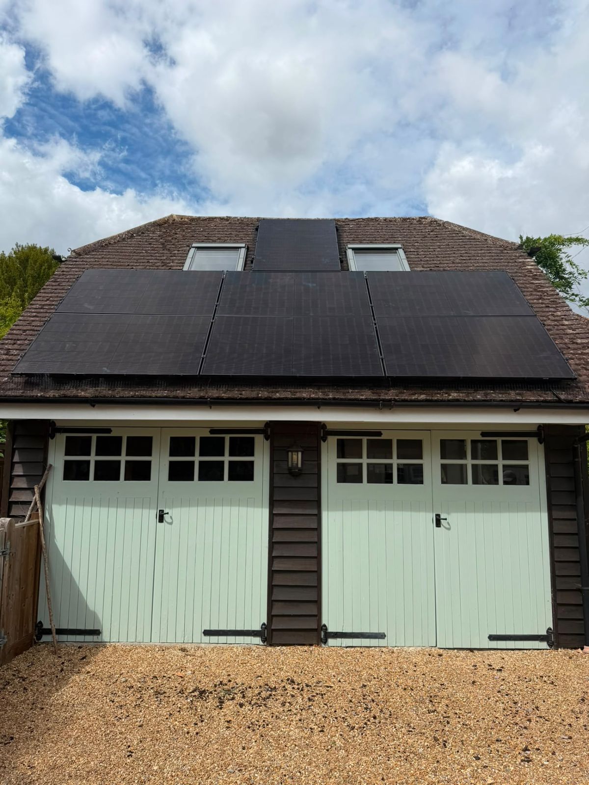 Solar panels fitted on the roof of a detached garage