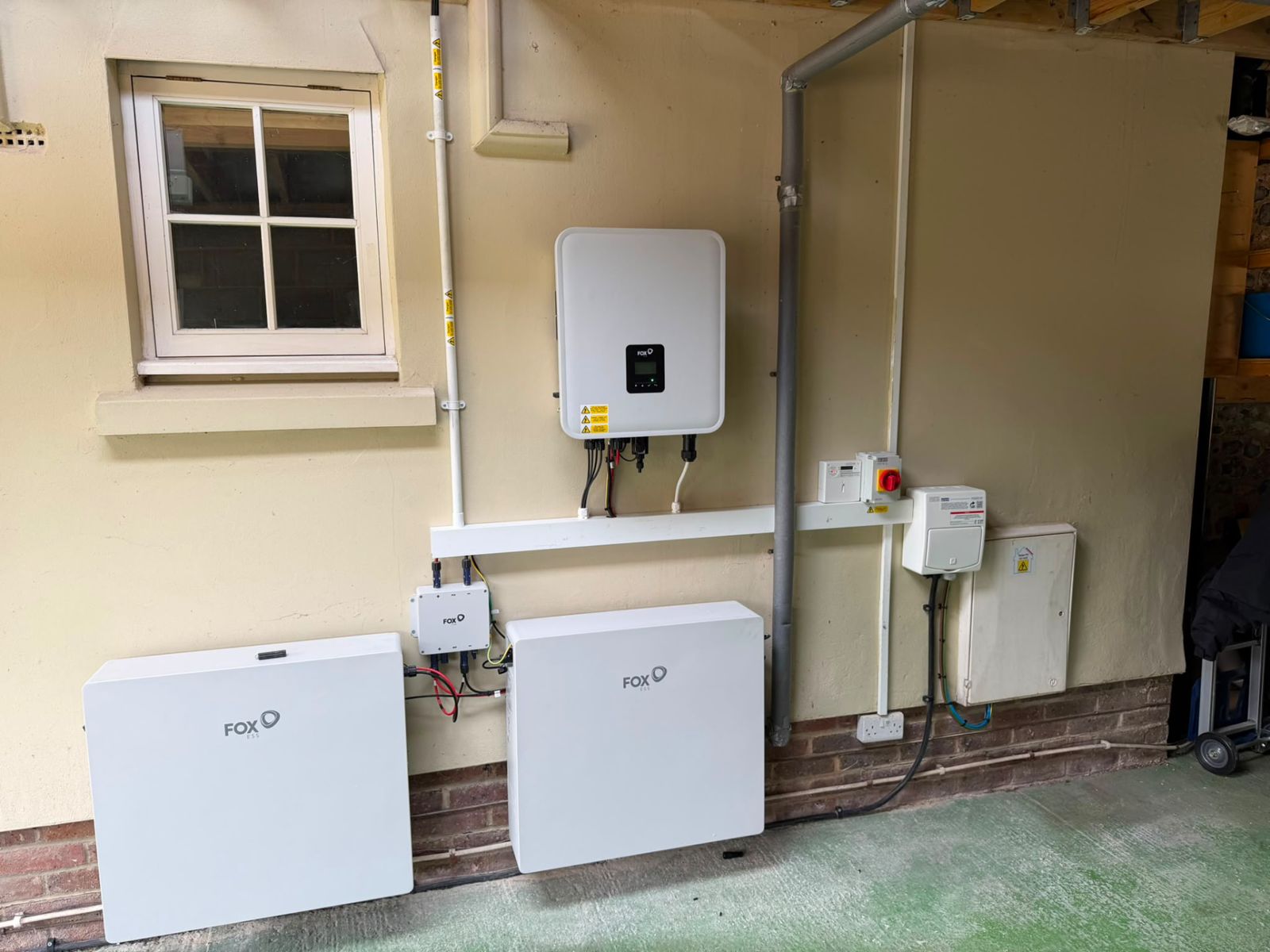 Neatly installed Fox ESS inverter and two home batteries